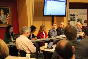 A panel of researchers and city representatives react to research findings about distributed transportation futures.