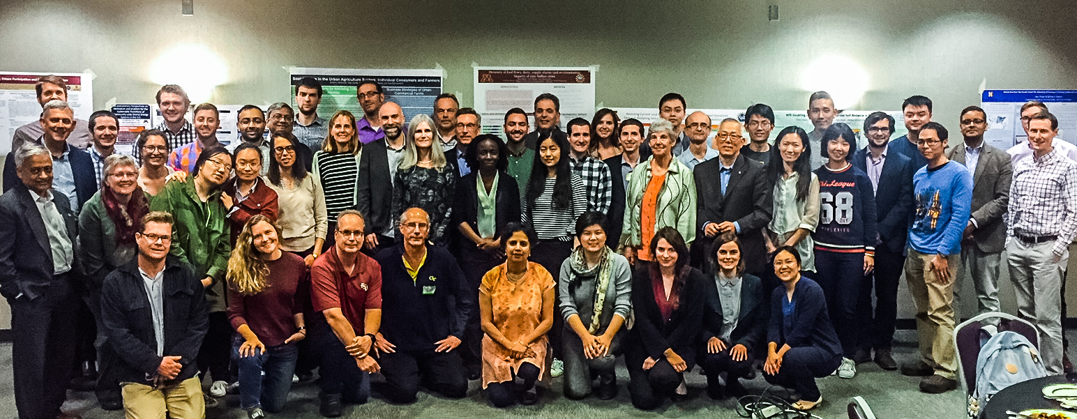 SHC Researchers and External Advisory Committee Members gather for a group photo during the evening poster session